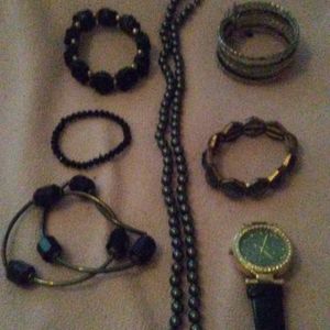 Black bracelets, watch(needs new battery), necklac